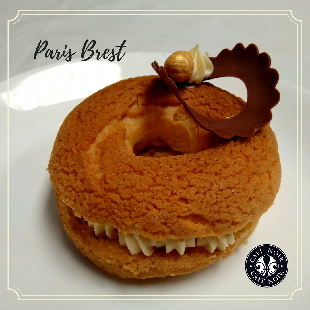 CafeNoir_India's tweet photo. The new Paris Brest is coming soon across all our outlets and is a delice! Very light in texture and amazing in taste. So swing by Café Noir and treat your taste buds with this classic French pastry. Bon Appétit! https://t.co/BmnzBNwGoV