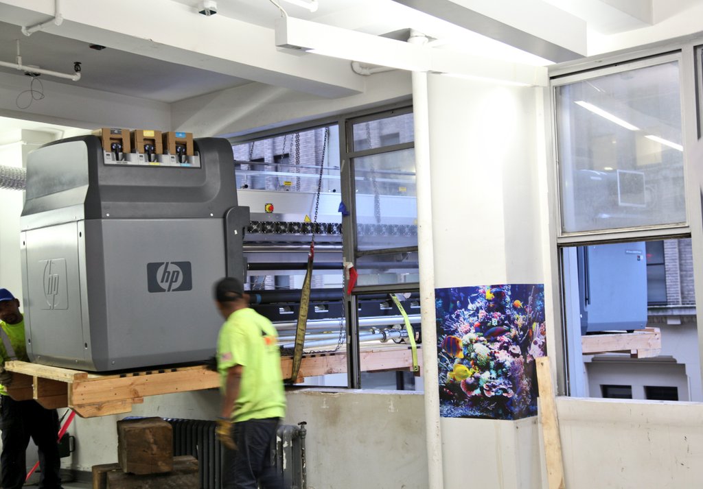 UnderVisualsNYC's tweet photo. Just pushing our old printer out through the window from our 3rd Floor Midtown NYC building to make room for newer ones, nothing to see here. #Printer #NYC #HP #Love #Ink #Design #Happy https://t.co/ZC8u0AxhIp