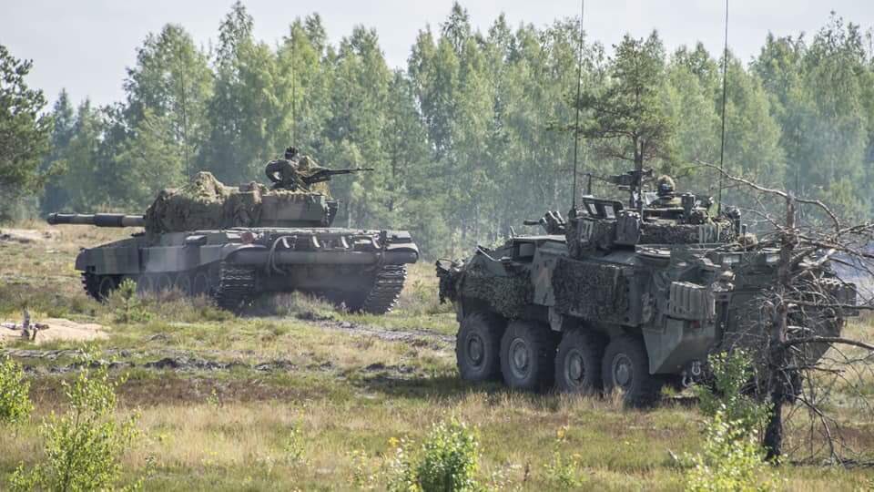 PLinNATO's tweet photo. This is #NATO!
#Polish🇵🇱 #Canadian🇨🇦 and #Spanish🇪🇸 troops train together in #Latvia🇱🇻🤝
#NATO enhanced Forward Presence #eFP #BGLVA in action💪
Aim? To reassure, deter and defend.
📸 by #BGLVA
#WeAreNATO https://t.co/6VTy4vk1C6