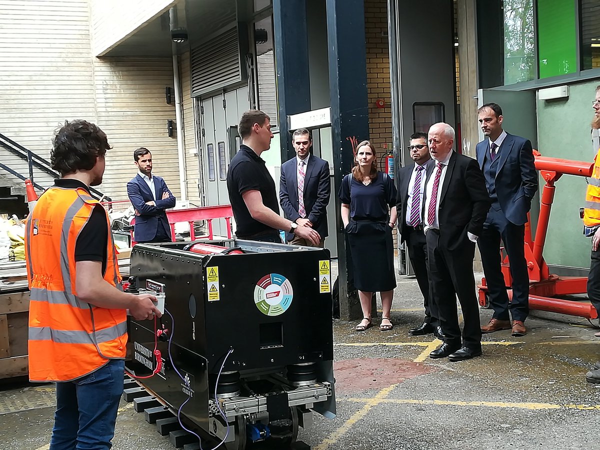 bcrre's tweet photo. PhD student Charles explains the Hydrogen Hero train and his research to @AndyMcDonaldMP and the group. Silent and totally green at the point of running and, scaled up, H2 is good for discontinuous and discrete electrification. #revolutionisingrail @eps_unibham @SchoolofEng_UoB https://t.co/Uzwh1VqOQj