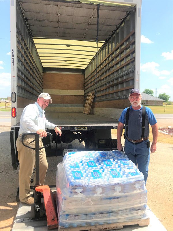 EmpirePaper's tweet photo. Recently, Scott delivered 40 cases of donated water to the Bowman Volunteer Fire Department on behalf of Empire Paper.  Thank you Bowman VFD for your service to our community! https://t.co/468mL6nOeb