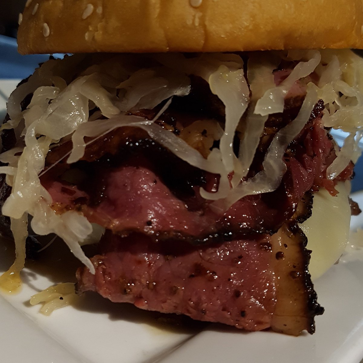 StackSmmmoked's tweet photo. The Reuben Burger (yes there's an 8oz burger under that pastrami!): our house-ground half pounder topped with sauerkraut, Russian dressing, Swiss cheese and smoked pastrami. Can you?
 .
.
.
.
.
.
#StackSmmmoked  #StackToronto #StackLove #BBQLove #TorontoBBQ #TorontoBurgers https://t.co/ZGqE5Mc05C