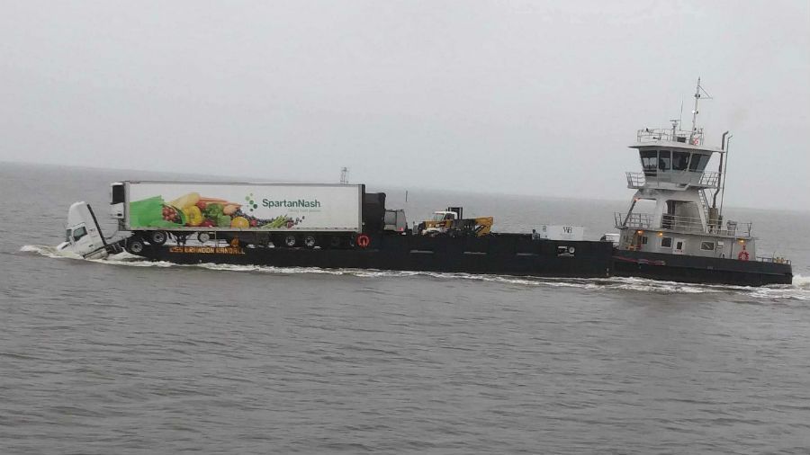 wectnews's tweet photo. Oops. Tractor-trailer partially slips off barge near Bald Head Island. https://t.co/Jnu7JDzERa https://t.co/fp0I3Z5QoP