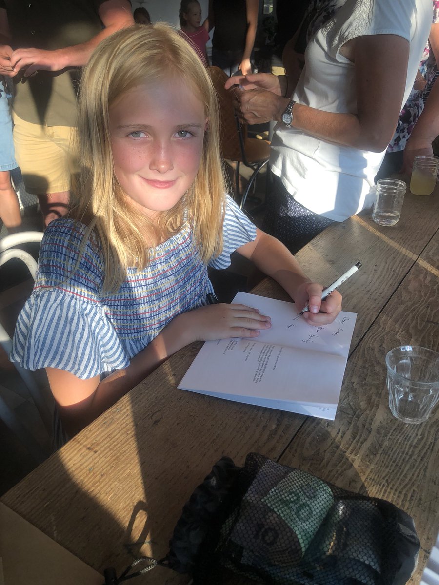 ReadWriteMore's tweet photo. So proud of this beautiful little soul. It was so fun to watch her sign her books and read her first chapter with emotion and confidence. Hopefully the first of many books to come. #readmorewritemore https://t.co/0xZtEyE8WN