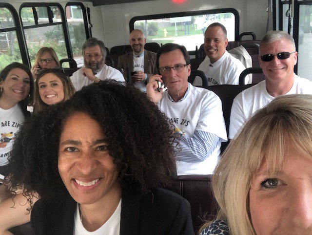 uakron's tweet photo. Some excited Zips on their way to celebrate the opening of the @LJFamFoundation #IPROMISE School! It's a big day in The City of Akron! @KingJames #WeAreZips #WeAreFamily https://t.co/MVQcy4N6bp
