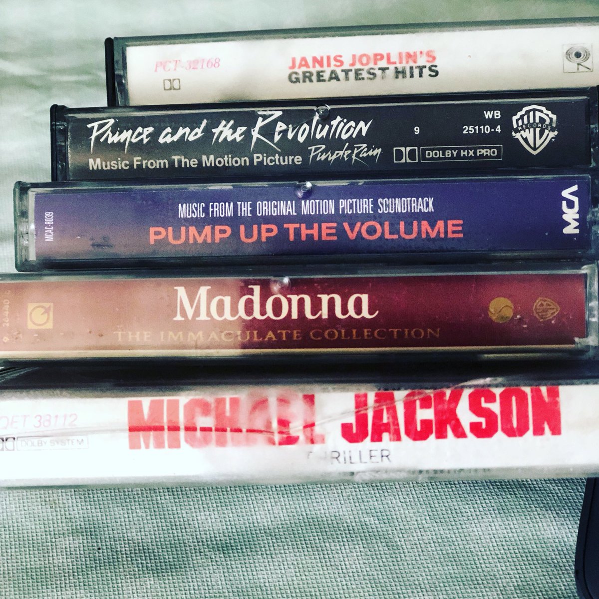jenstewart77's tweet photo. That moment your mom hands you a bag of your “childhood stuff” and inside are the tapes that shaped your musical life. Not shown - the 8 mixed tapes from friends. #music #someonefindmeacassetplayer #makemeamixtape #momiscleaninghouse https://t.co/F3ni67c8ZN