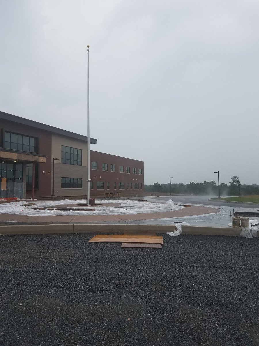 WC_WolfPack's tweet photo. A little rain could not stop our flag pole from going up today! So excited! https://t.co/iTRfZxPrRG
