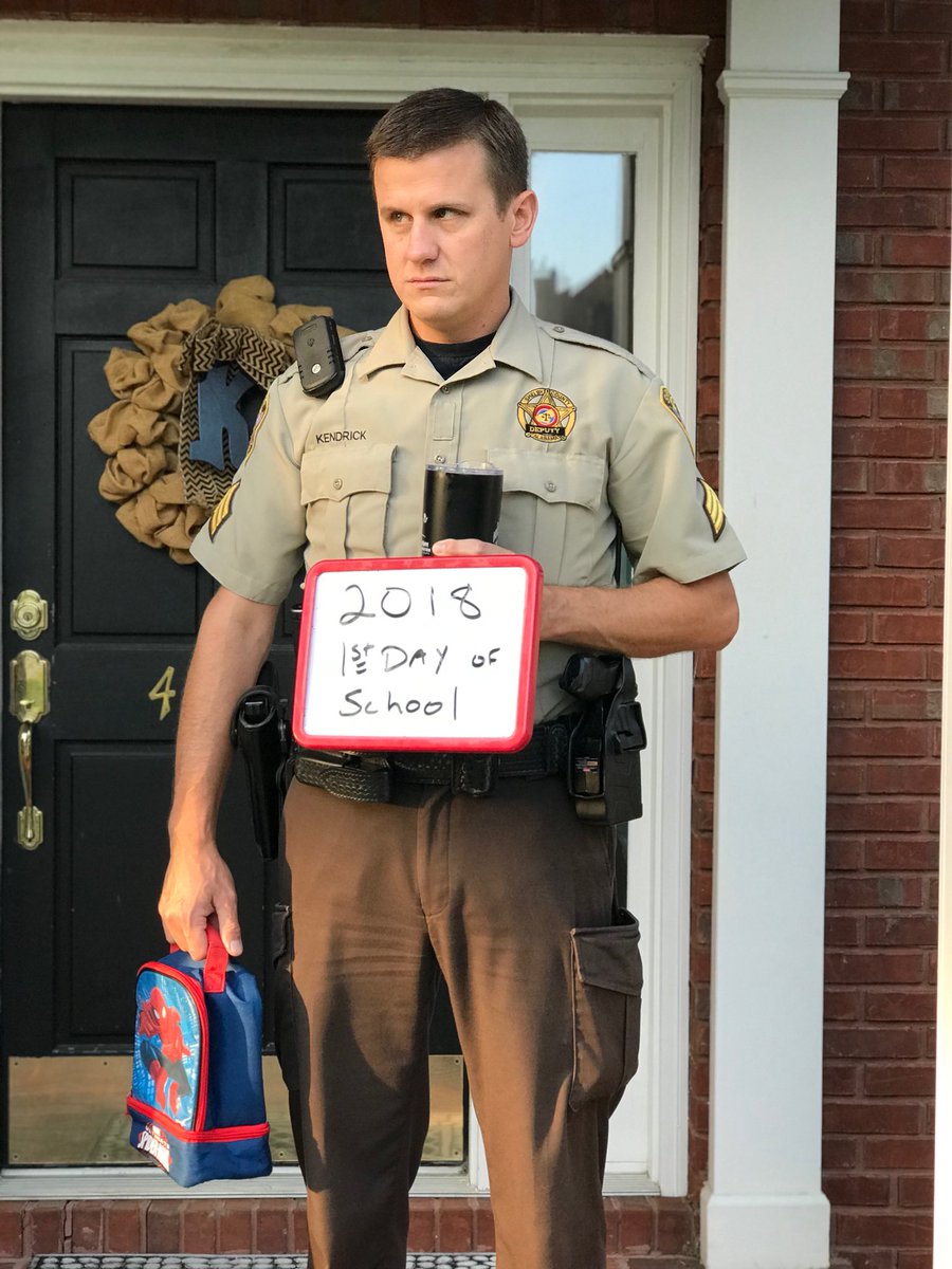 ShelbyCountySO's tweet image. Sgt. Nathan Kendrick reluctantly poses for his first day of school photo.