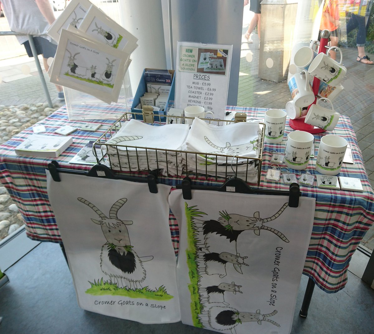 NorthNorfolkDC's tweet photo. The 'Goats on a Slope' merchandise has been flying off the shelves at the North Norfolk Information Centre in #Cromer - if you enjoyed seeing them on the cliffs and would like a memento pop by 🐐 Please use #CromerBagots in your pictures of them so we can see what they're up to! https://t.co/kzSjP2fMlr