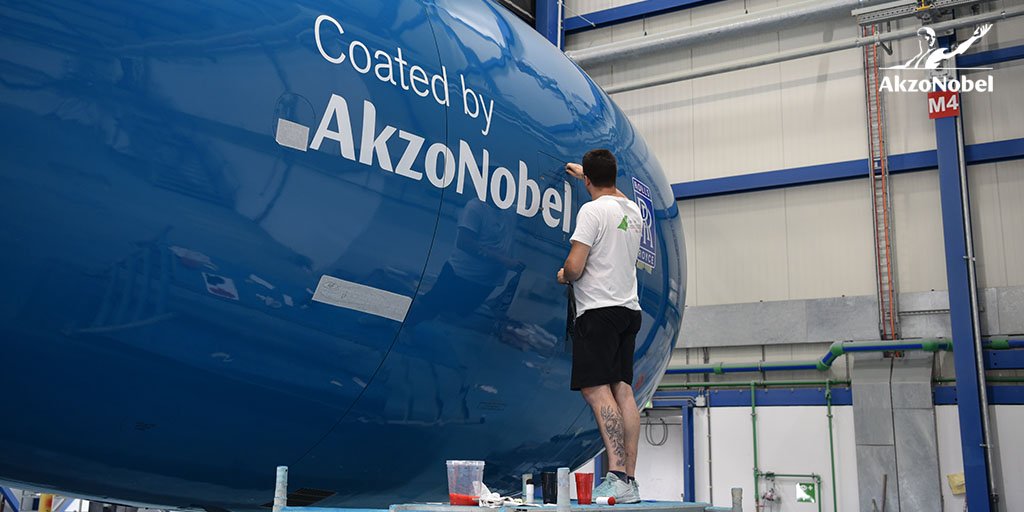 AkzoNobel's tweet photo. Have you ever wondered how we produce our striking ✈️ paintings? Have a look behind the scenes to see how we worked with @mirpuri_org to paint a @hifly_airline aircraft to save the world's #coralreefs https://t.co/YLm7YqXuT3