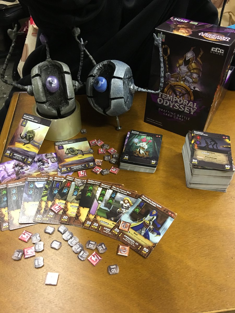 #Temporalodyssey releases at #GenCon this year! Come check@it out at the <a href="/Level99Games/">Level 99 Games ( MegaGame Library on Gamefound! )</a>  booth 2149 and get a pick with our Scoops McGee and Johnny Donuts Props.