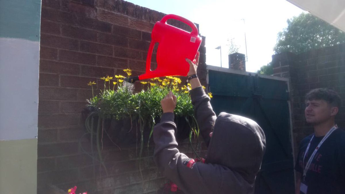 Tom keeping an eye on me whilst I’m watering the plants at our base. Helping the community a little bit at a time - Faye  #community #NCS #team3