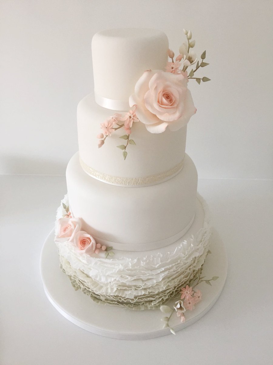 This one was worth the pain... ruffles and 35 degrees really did make me want to cry but it all came together eventually #weddingcakes #thelittlesugarbox #sugarflowers