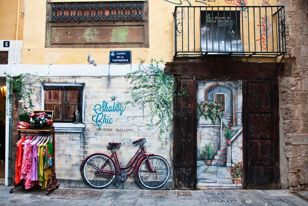 valenciaenbici's tweet photo. Segundo ataque vandálico al "mural de la bicicleta" de la calle Tapinería 
(Ciutat Vella. València) Una auténtica lástima 😢 https://t.co/ifK7qeFqzx