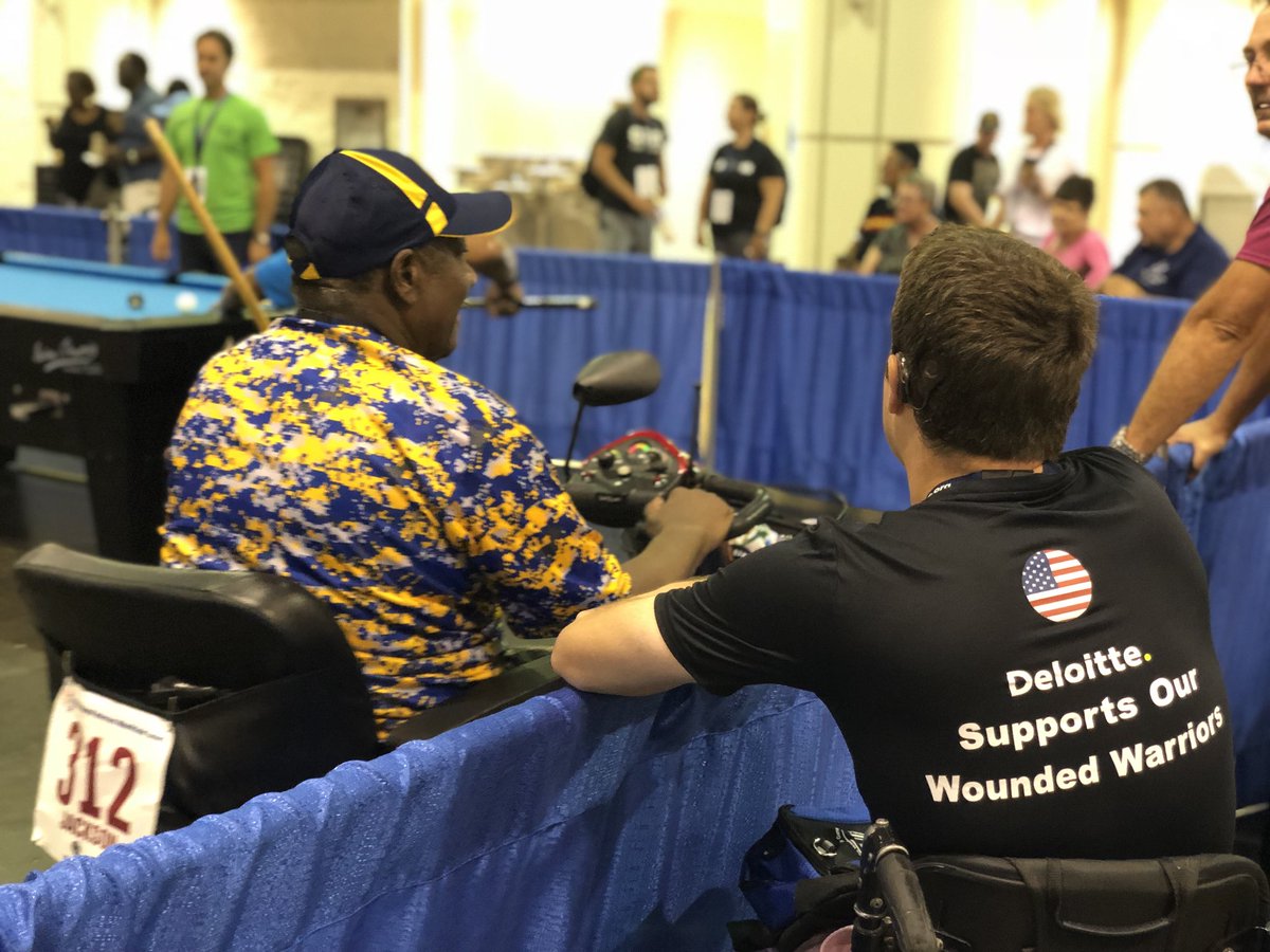 AshMcCabe's tweet photo. Good morning from the National Veterans Wheelchair Games! Ryan and the team are chatting it up by the pool tables and watching some serious competition #nvwg #DeloitteSupports @sports4vets @deptvetaffairs @deloittegov @deloitteus @pva1946 #PVAble https://t.co/szQSlEzMEJ