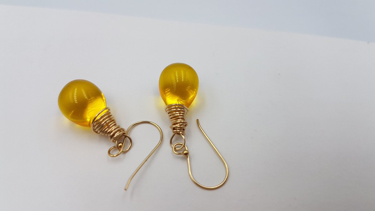 aurumbarn's tweet photo. Belle meets Cinderella in this sun ray yellow glass teardrop earrings hand wrapped in gold filled wire. @aurumbarn we make #Bridal #jewellery for the unsuspecting #brides #Handmade #gold #womaninbiz #wedding #aurumbarn https://t.co/Hkiz1tBofN