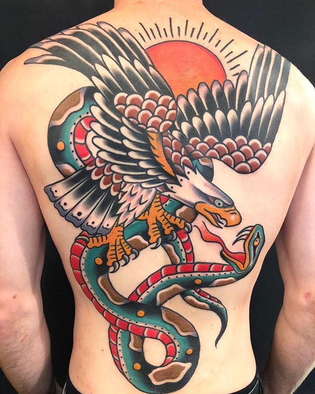 idlehandsf's tweet photo. Got to finish this one yesterday for Tony @idlehandsf thanks for your dedication to getting it done quickly. #idlehandsf #rosskjones #eaglevssnake #backpiecetattoo https://t.co/nsACwr138L