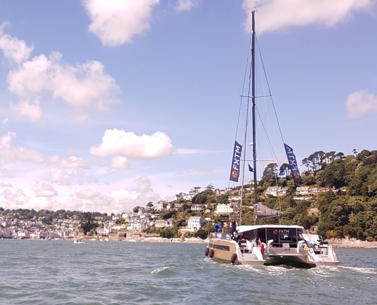 WSprangle's tweet image. Hired a very small motor boat today to take the family for a sail around Dartmouth. We spot this amazing Catamaran! It was only the bloody #longswim support boat. A friendly chap waved at us. Was this you @LewisPugh? Anyway, great work and best wishes!