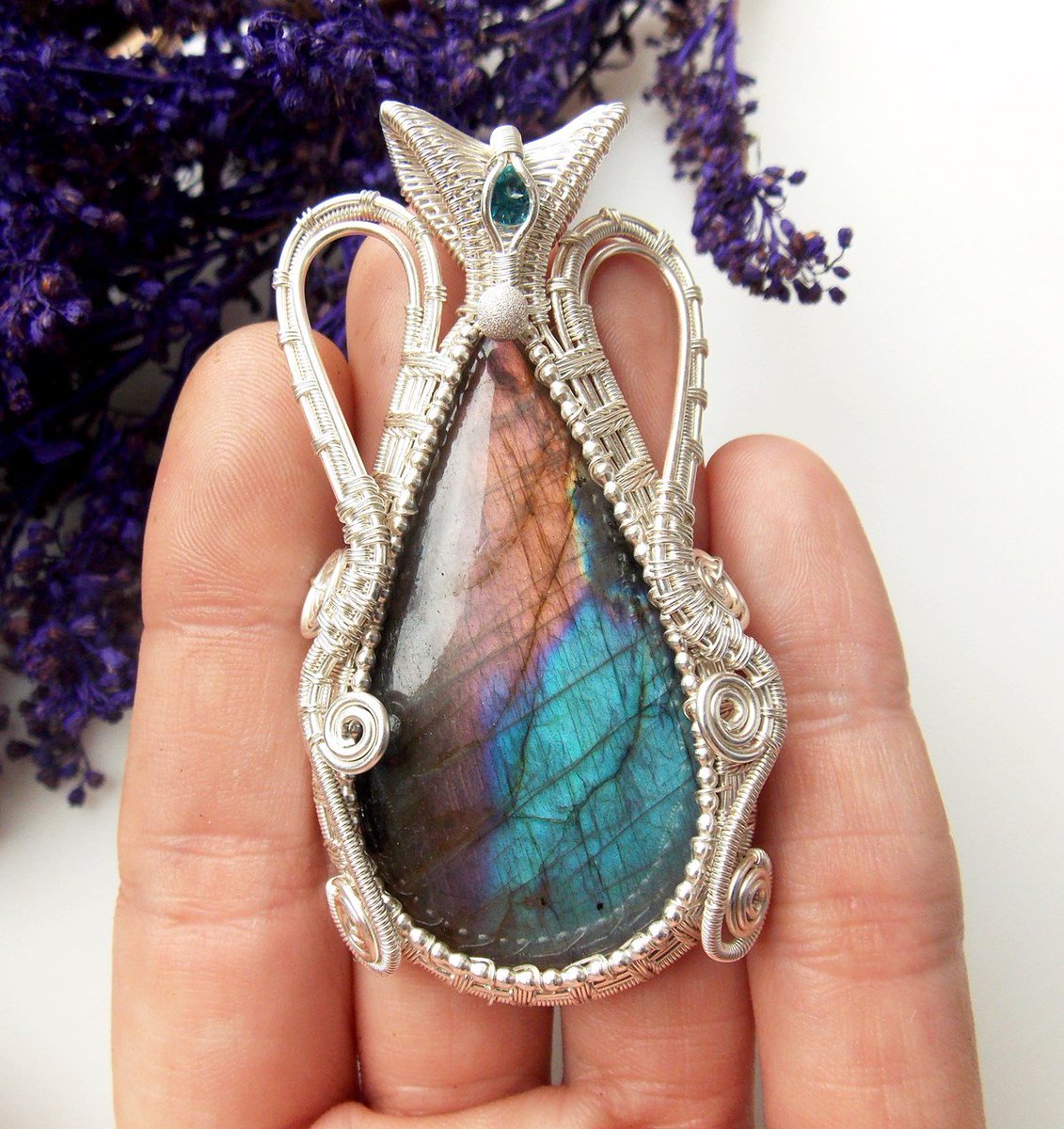 m_w_jewelry's tweet photo. Look at this amazing #purple and #blue #labradorite #pendant #wirewrapped in fine #silver and #sterlingsilver #beaded #wire and accented with a #faceted blue #topaz In my #etsyshop now https://t.co/2qg0eSKtDq
#wirewrap #bohojewelry #handmadejewelry #crystalhealing #wireweaved https://t.co/y6N4pkInLl