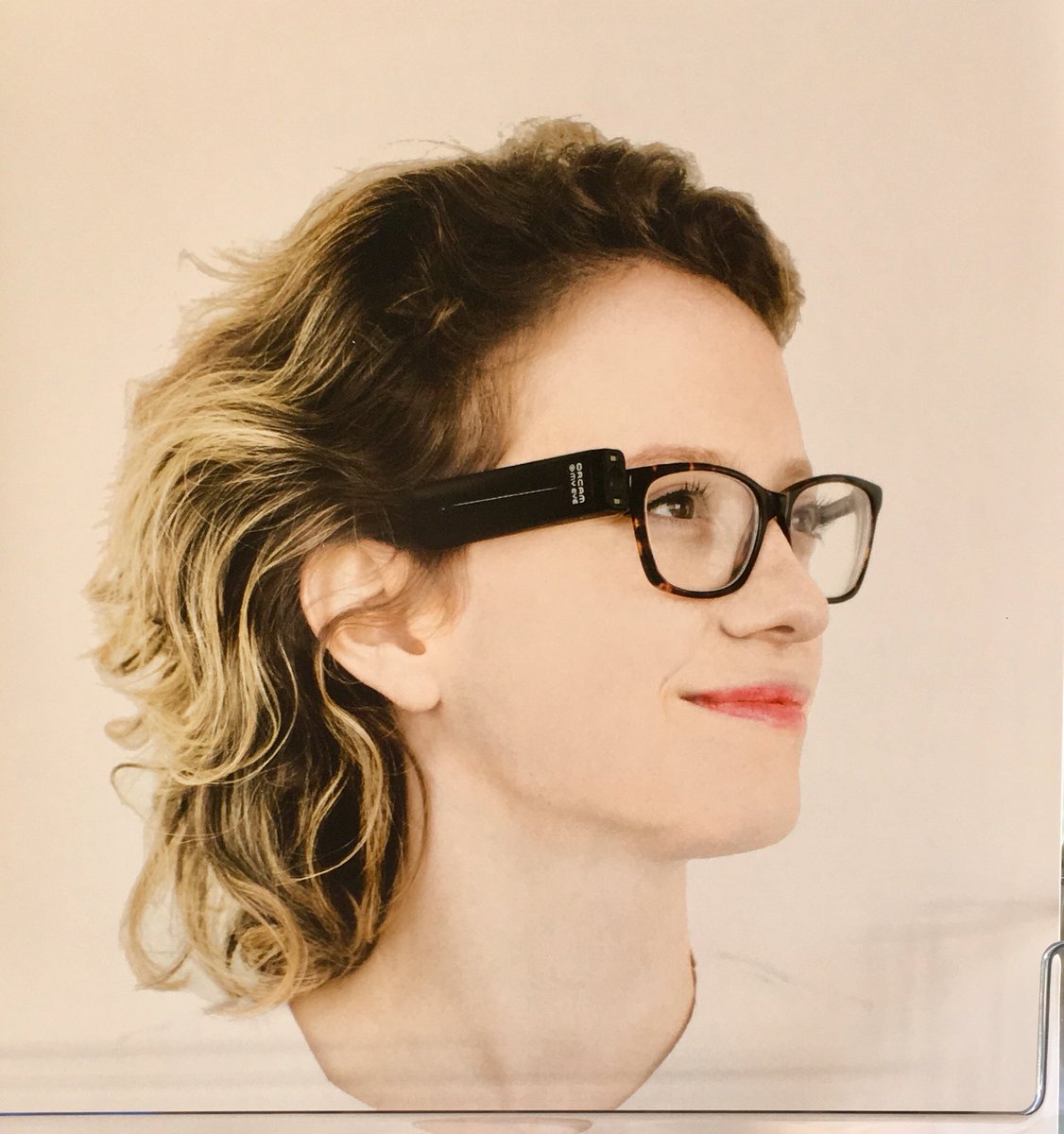 A young lady wearing the new wireless OrCam 2  attached to her glasses !!