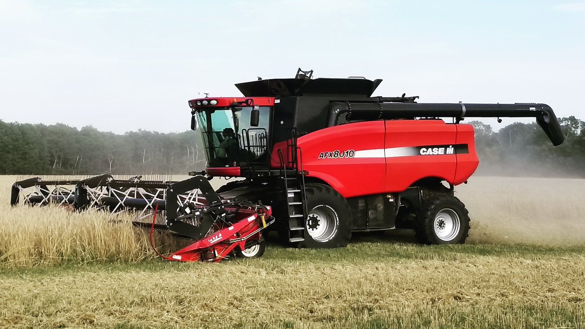 Dt8010's tweet photo. July harvest underway. Few acres of our own and then onto custom acres. This year we added this blacktop we found at enns bros. #trainingmachine https://t.co/ax3t3SHcFn