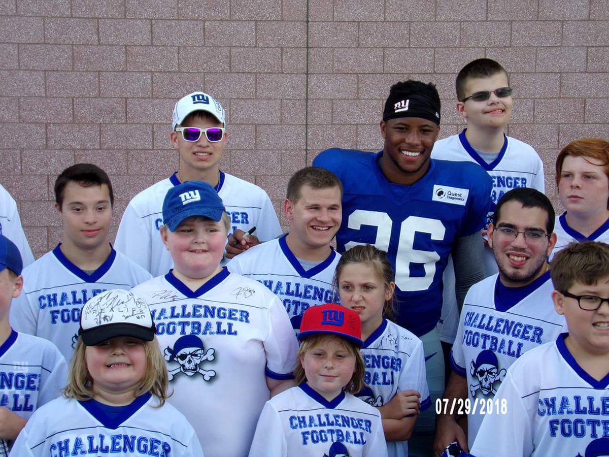 Special moment for the challenger players meeting big blue #26 Saquon Barkley #GiantsCamp