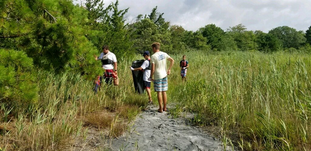 SaveBarnegatBay's tweet photo. Big thanks to the 12 junior sailors from Shore Acres Yacht Club who collected 10 bags of garbage from the marshes surrounding Mallard Point today. It was true #MarshMadness out there and they did a fabulous job cleaning up Barnegat Bay! #SBB #BayCleanup https://t.co/YYLY7LxXgl