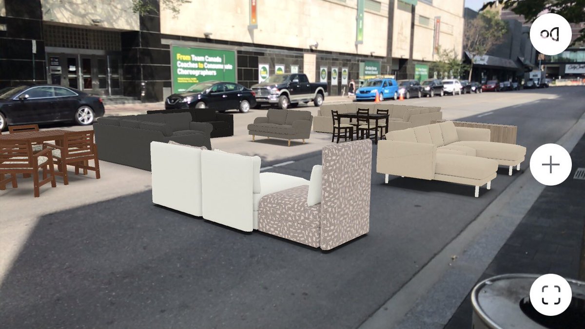 Killing time waiting for the bus by filling the street with Ikea furniture. The future is not quite what I expected.