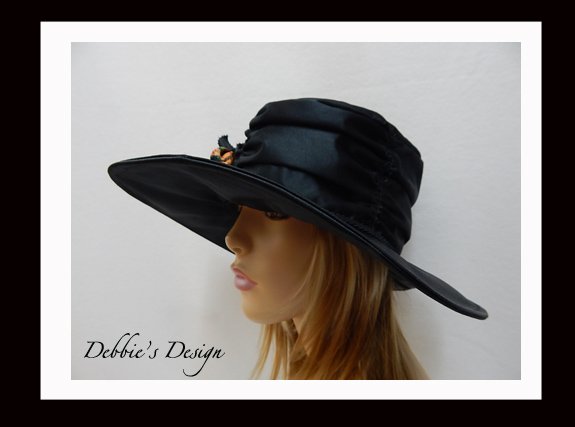 debbiesdesign's tweet photo. https://t.co/VIEwKGGj0H

This elegant women's wide brim cloche hat has been designed using high quality shinny black upholstery fabric. The brim has been fused, and wired with millinery wire. The hat band has been designed with several gathered sections giving it a unique look. https://t.co/XKrQ6emTct