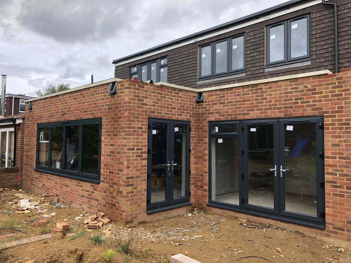 KonceptHome's tweet photo. Anthracite grey UPVC windows and French doors, along with a 4 metre wide aluminium bifold window installed for a trade customer today in Pyrford near Woking. Will look amazing once the job's all tidied up and finished off. 
#bifolds #doubleglazing #anthracite #homeimprovement https://t.co/e6mfe5YBt3