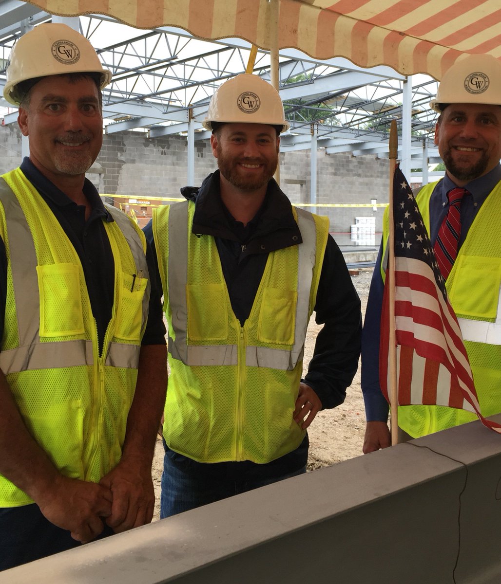 CaldwellWalshHQ's tweet photo. Another project milestone at Newtown Community Center as steel erectors set the #finalbeam at the #toppingoff ceremony. Congrats! https://t.co/Hw04H5WEBa