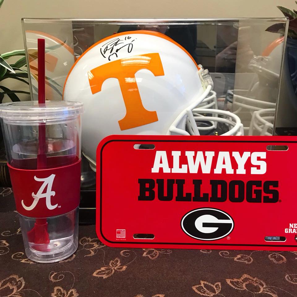 philcalandra's tweet photo. The #collegefootball countdown is on! Just 31 days until #kickoff and the #calandrafinancial team is already bringing the school spirit! What team will you be rooting for on #gameday? #govols #rolltide #godawgs https://t.co/7q2uW9F30B
