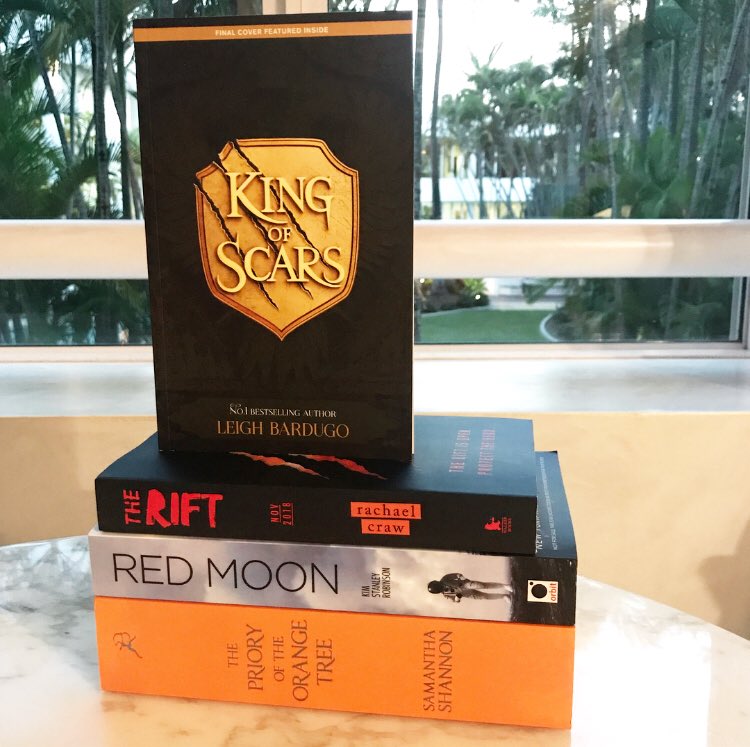 theyacircleADL's tweet photo. Throwback to #DymCon18 last week when I picked up a whole bunch of amazing books! Including these 4 which I am very excited about!
#KingofScars sampler by @LBardugo 
#TheRift by @RachaelCraw 
#RedMoon by Kim Stanley Robinson
#ThePrioryoftheOrangeTree by @say_shannon https://t.co/K1gjsicvPb