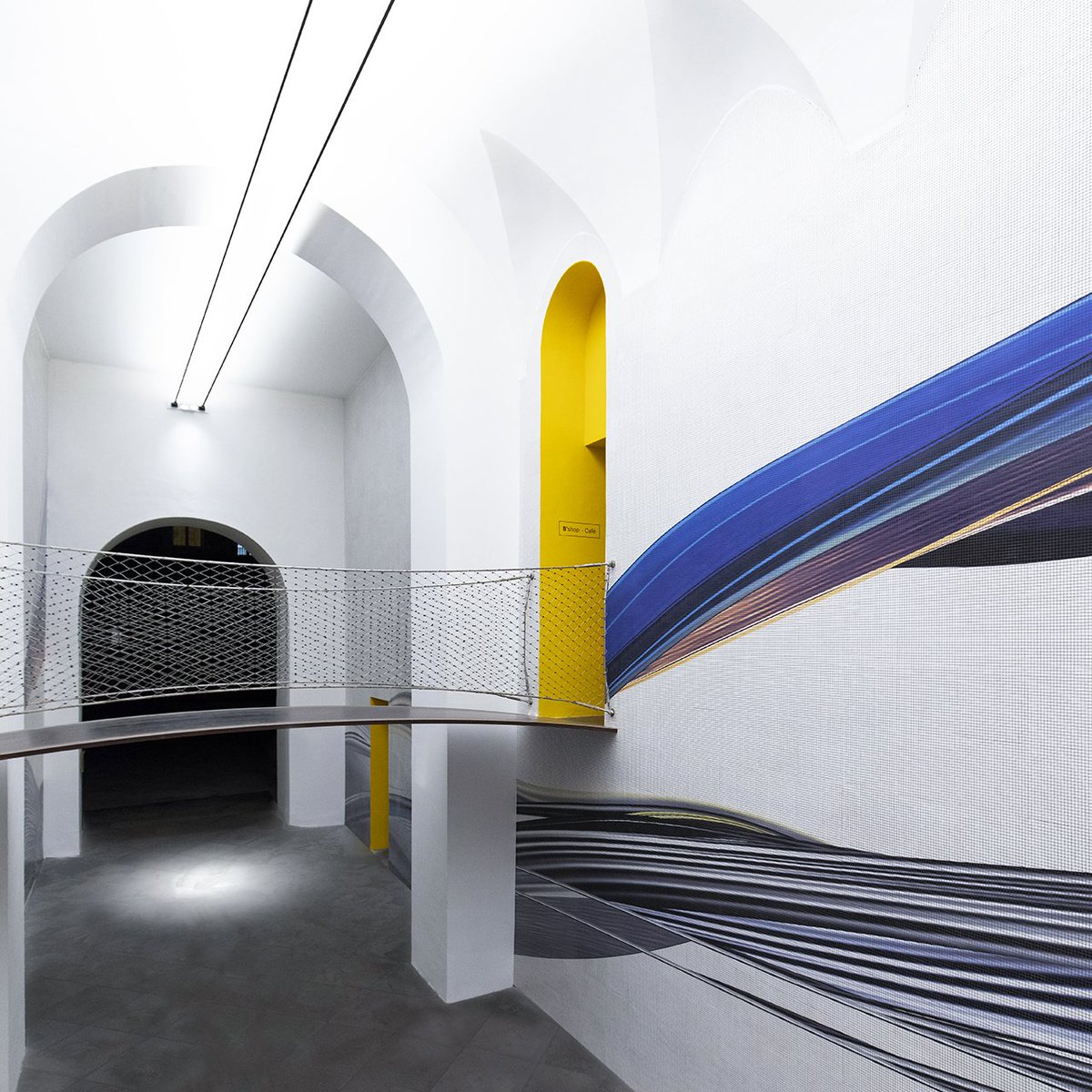 Davide Groppi's INFINITO lamp has been used to light a work of art by Paul Thorel. Passaggio della Vittoria by London artist Paul Thorel, was created especially for the Museo Madre in Naples.
Site-specific permanent installation
Produced @mutinaceramics 
Photo©AmedeoBenestante