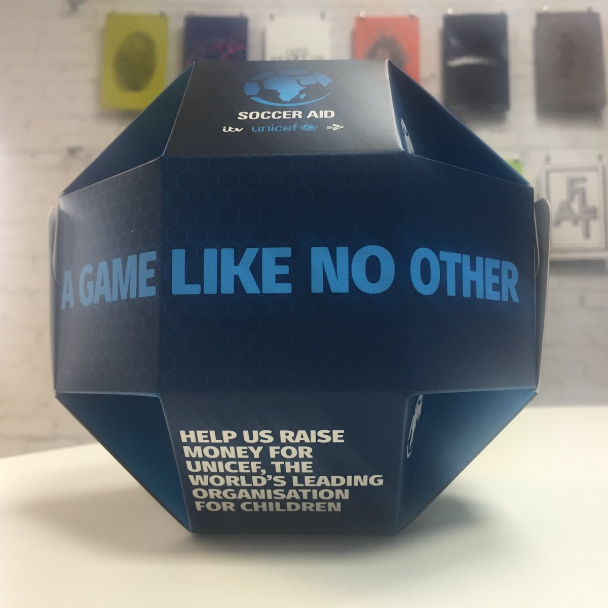 Hartgraph's tweet photo. Creative design by Pages Creative (https://t.co/afQdzXNpZZ) along with sharp print and cutters can turn flat sheets into a ball @socceraid @ITV #print #design #printfinishing #cutterguide #Creative https://t.co/bHuRlk7krX