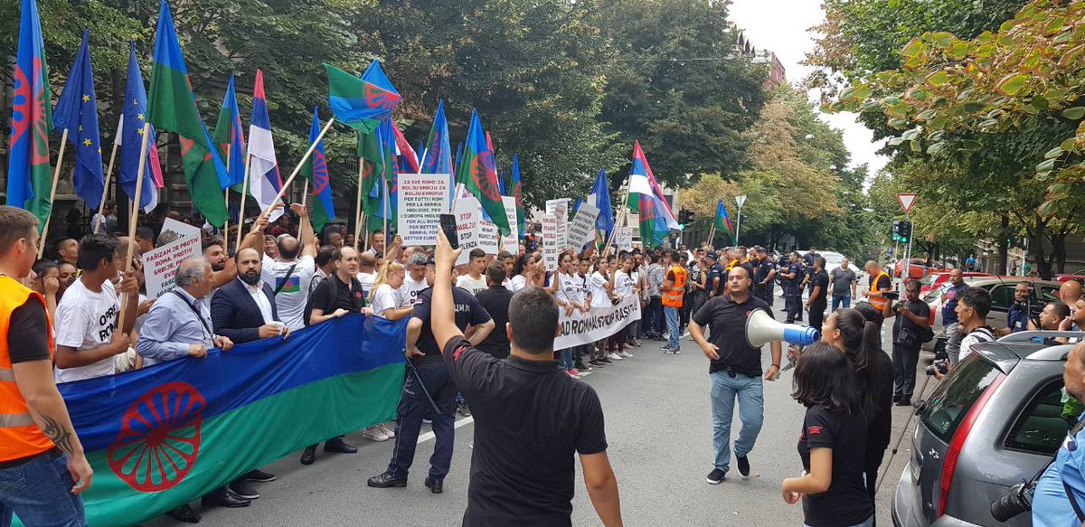 jovanovicz's tweet photo. In Serbia,  in front of the Italian embassy, #Roma commemorate #August2 #RomaGenocide and protest against the politics of hate promoted by Minister #mateosalvini. Their strong messages defend the dignity of our communities and European values. #OpreRoma. https://t.co/Xw9XmoNSUZ