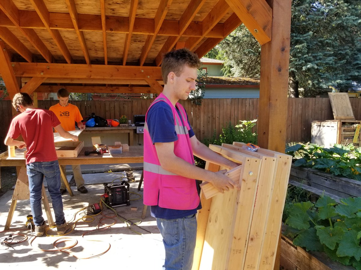 Some of our students working hard on cornhole boards for our Cornhole Classic fundraiser coming up in September!