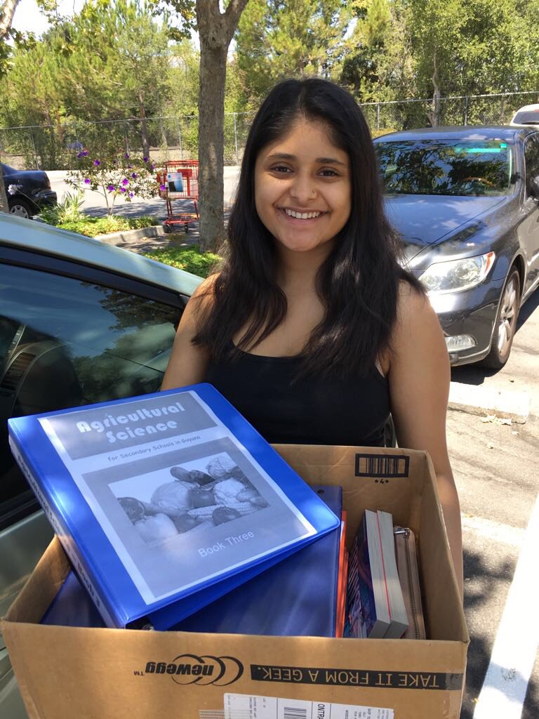 When matched with a school, our BDO’s get to learn the specific needs of that community. Here is Mira W. collecting agricultural books for her partner school, Nyedu Jr. Secondary School in Sierra Leone!