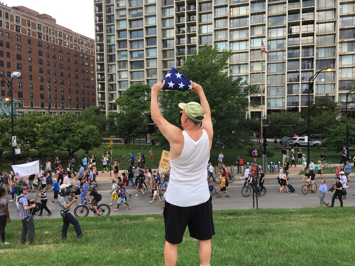 _TonyBriscoe's tweet photo. I just talked this man and asked if he was a supporter or casual onlooker. He showed me his tri-folded flag and said, “This is all I have to say, Tony.” #LSDmarch https://t.co/qxQSFmVOYJ