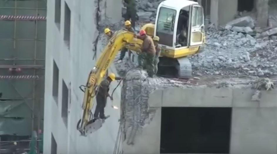 When playing with fire isn't enough, dangle yourself over a building while standing on a precarious piece of equipment. That seems smart. #safetyfail #OSHA  #workplacesafety