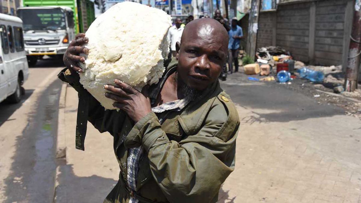 KinyanBoy's tweet photo. When Nairobi County enforcement officers stormed Kilimani area to bring down illegal structures, for one man, there was only one precious thing to save; ugali.

Not just any piece of ugali but a gigantic piece. #UgaliMan https://t.co/xZupWKHmVA