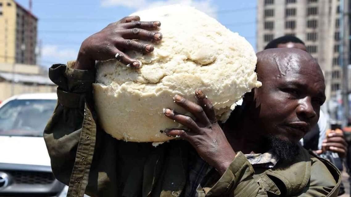 KinyanBoy's tweet photo. When Nairobi County enforcement officers stormed Kilimani area to bring down illegal structures, for one man, there was only one precious thing to save; ugali.

Not just any piece of ugali but a gigantic piece. #UgaliMan https://t.co/xZupWKHmVA