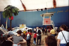 The Living Island zone, completely concealed from outside view, had guests journey through a "tunnel of love" into a fully enclosed model of a British island resort - though not all was as it seemed. The entire area was built with recycled materials, with an ecological theme.