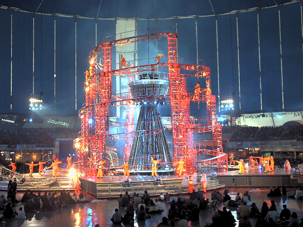 The show utilized wire acrobatics, massive flame jets, and culminated in building a tower from the earth to the sky, made of giant graffiti chunks of concrete. Guests complained that the show's plot was barely coherent, and judging from footage, I have to agree with them.