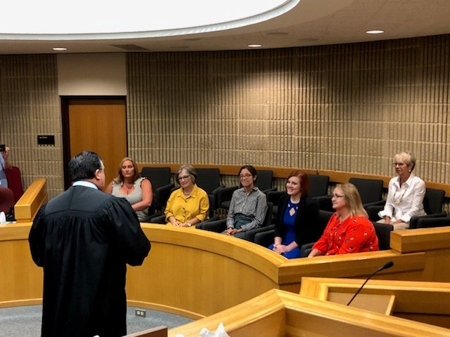 On August 2nd, we swore in 6 new Advocates! We are so excited to have them join our CASA family!
From left to right: Judge Larry Phillips, Judge Jim Fallon, Liberty Johnson, Jacki Cooper, Sandi Hoover, Candace Tormos, Joy Lesinski, Laura Branton and Judge Brian Gary.