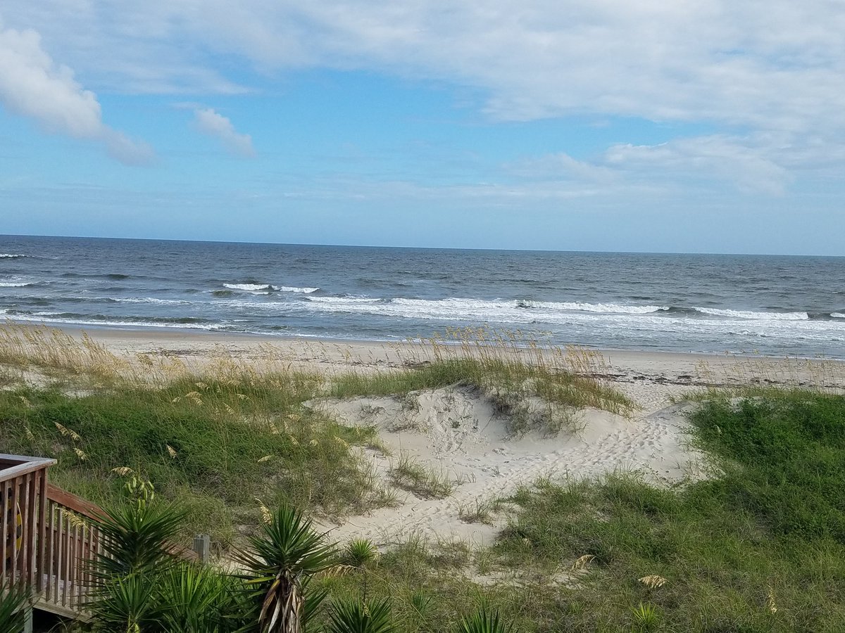 SoccerMomLa's tweet photo. Not the best weather for vacay but in two weeks we have yet to have a day completely rained out.  And we still wake up to this.  #EmeraldIsle #2018 #LashBash https://t.co/YYneKKqChA