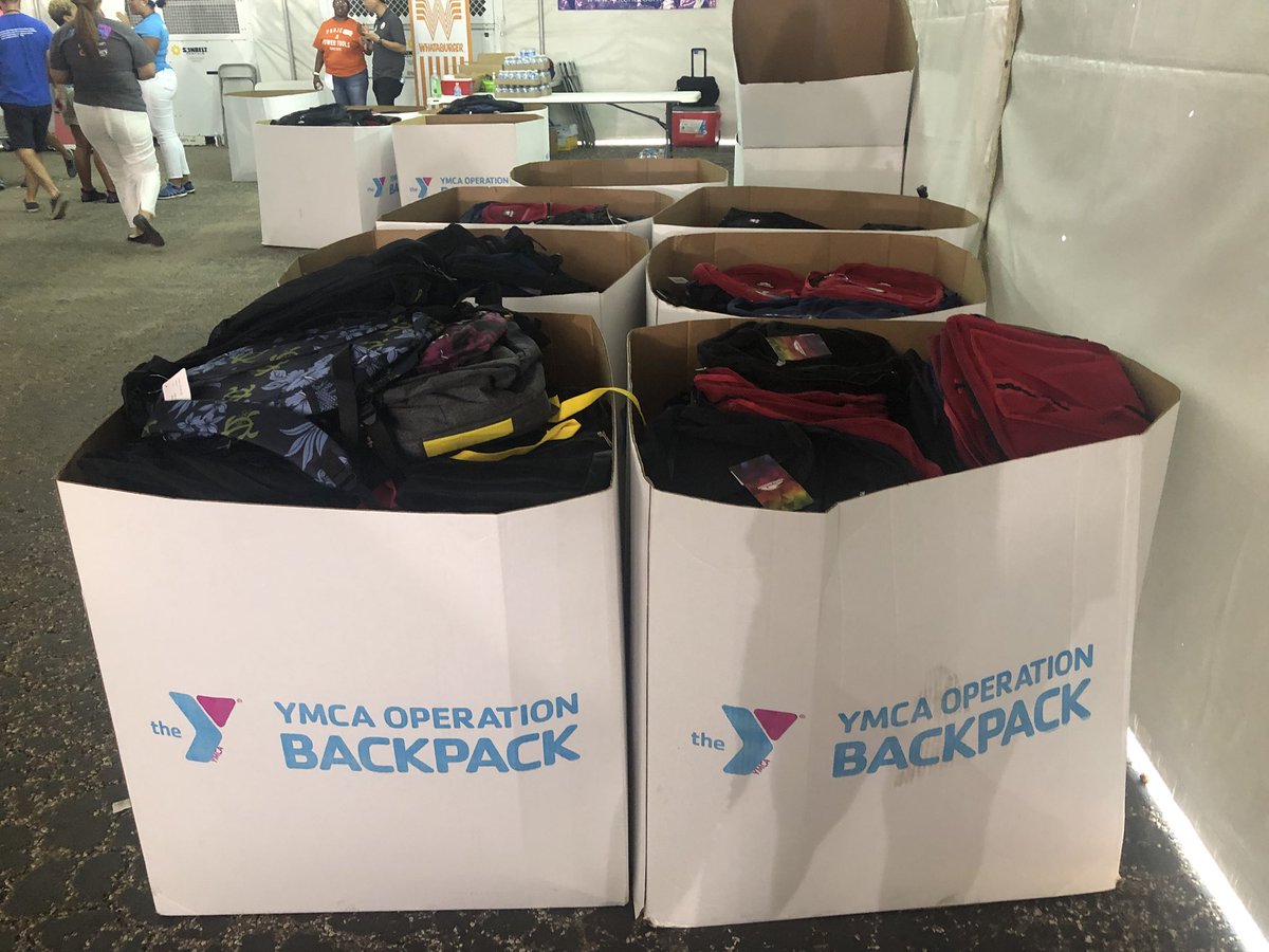 abc13houston's tweet photo. All 😁 here at our studio till 6pm accepting backpacks and school supplies! Our amazing volunteers are stuffing backpacks for Houston area children through the @YMCAHouston. #YMCABackpack #OperationBackpack #BackpackMountain https://t.co/MDZzprI0Yc