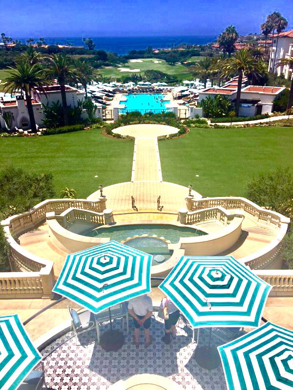 TathamSmith's tweet photo. I took this photo of our hotel and my daughter edited it. I love the way the umbrellas look. https://t.co/EHuXEAB3XT