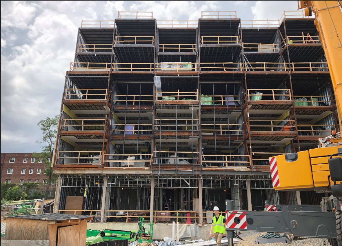 DCDGS's tweet photo. Check out the #progress! The modules on the Ward 8 Short-Term Family Housing building have been fully erected. The site utility connections are continuing and roof installations have begun. Can't wait to see the finished product! #DGSDelivers #ThisisConstruction #Modules https://t.co/N5kB8SPqgY