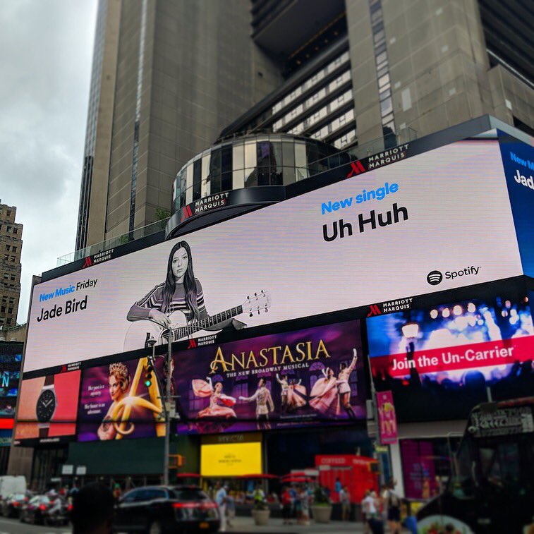 JadeBirdMusic's tweet photo. Mum! I’m on a billboard! As surreal as this is, my tiny face is huge in @TimesSquareNYC 😂💛 An absolutely huge amount of love to @Spotify we’re on New Music Friday in 12 countries 🙌🏼🔥💫 https://t.co/arQxpul8WG